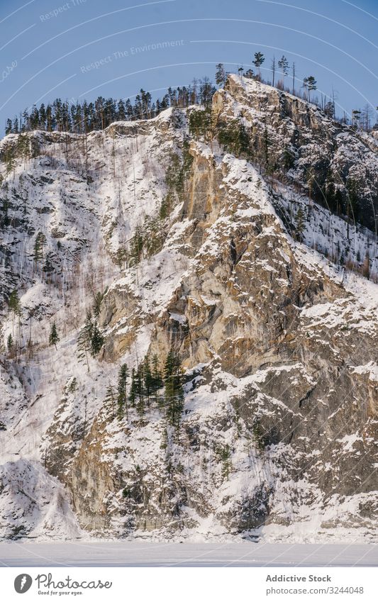 Winter landscape with snowy rocks and blue sky valley winter mountain siberia nature hill cold scenic russia environment wild white tranquil silent calm