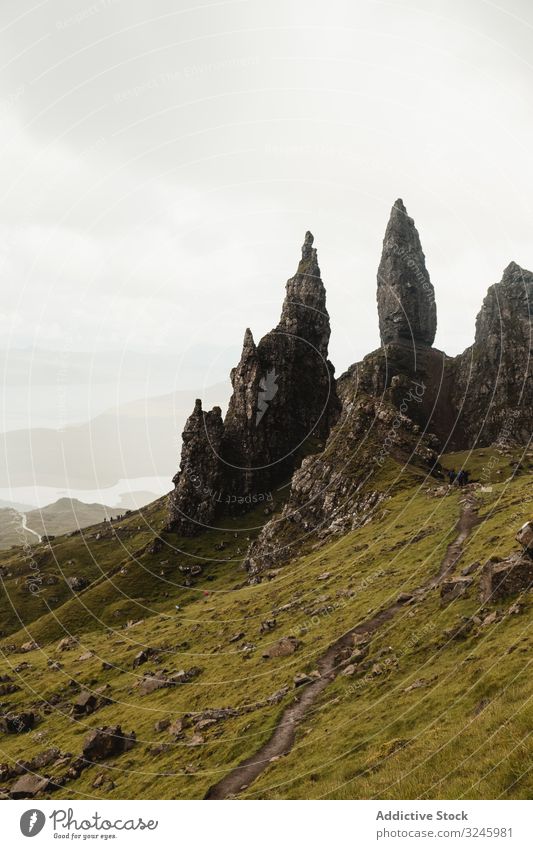 Wonderful scenery of highland under lush dramatic clouds valley mountain sky hill height ridge horizon tranquil fresh wild river idyllic overview scotland