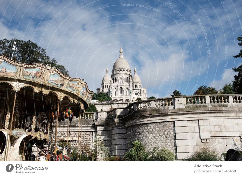 Elegant big cathedral with rocked fence on blue sky temple architecture travel church tourism ancient culture historic tower building city landmark destination