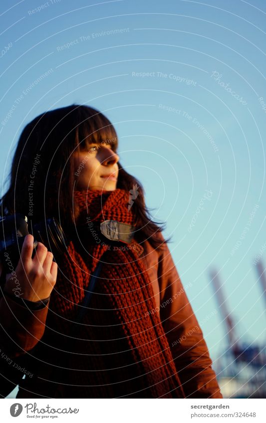 Why wander far and wide when happiness is so close? Woman pretty Sky Hamburg Harbour Blue Elbe Sunset camera Smiling relaxed Winter Cold long hairs Town