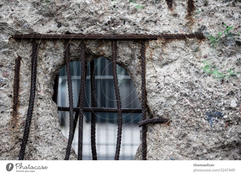 Barred hole in the Berlin Wall Tourism Freedom Sightseeing City trip Capital city Downtown Manmade structures Wall (barrier) Hollow Wall (building)