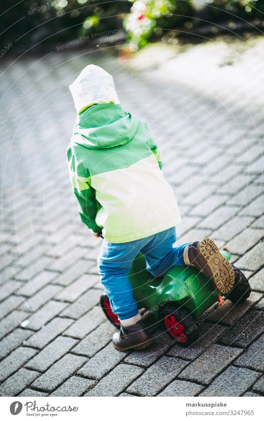 Boy with toy vehicle Playing Parenting Kindergarten Child Boy (child) Brother Family & Relations Infancy Body 1 Human being 3 - 8 years Toys driving device