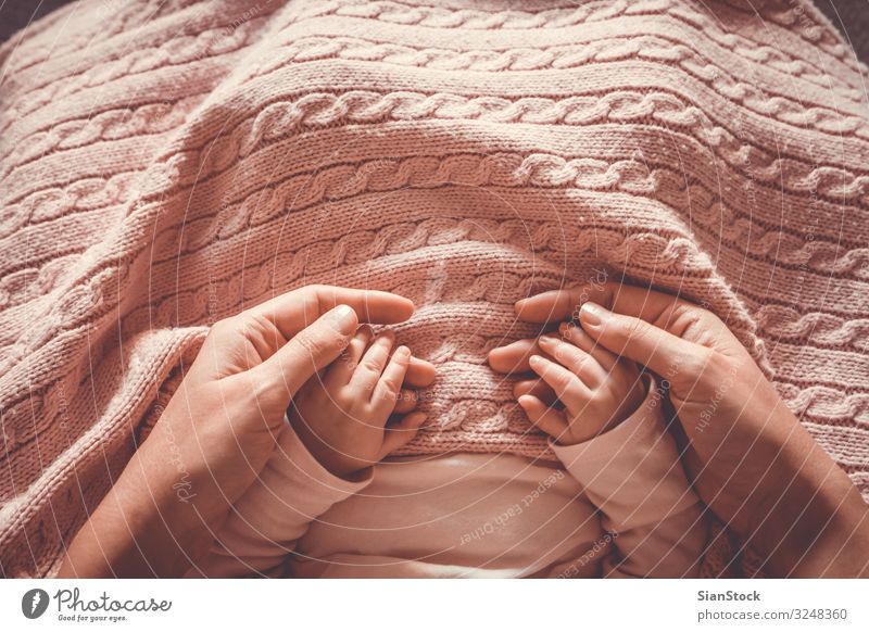 Mother holding her baby's hands Beautiful Body Skin Life Child Baby Woman Adults Parents Family & Relations Infancy Hand Fingers Love Small New Cute Soft White