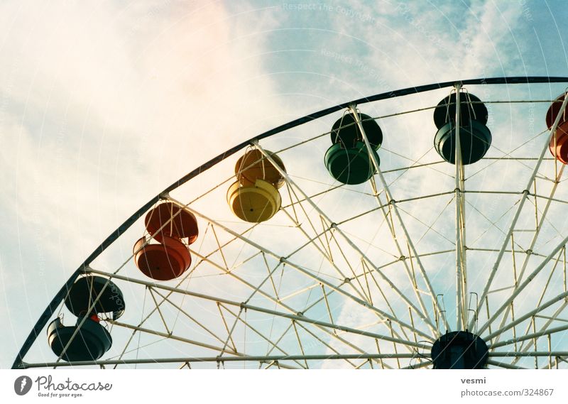 Ferris wheel Lifestyle Relaxation Calm Leisure and hobbies Playing Amusement Park Sightseeing Summer Sun park Attraction Sky Clouds Russia Vacation & Travel