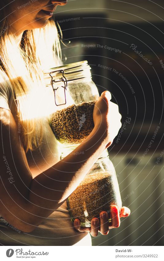 sustainable - woman with preserving jars as storage containers Sustainability sustainability Preserving jar To hold on grains do-it-yourself Healthy Eating