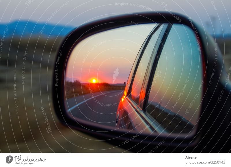 in retrospect Landscape Sunrise Sunset Beautiful weather Hill Plain Street Car Rear view mirror Car Window Mirror Reflection Driving Illuminate Authentic