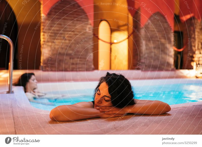 Two women enjoying Arabic baths Hammam in Granada Lifestyle Luxury Beautiful Medical treatment Relaxation Spa Sauna Swimming pool Leisure and hobbies Decoration