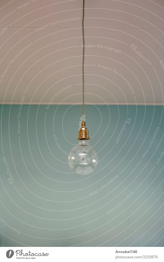 hanging light bulb blue pastel background. minimal concept. Style Design Decoration Lamp Business Technology Art Fashion Old Simple Bright Modern Retro Blue