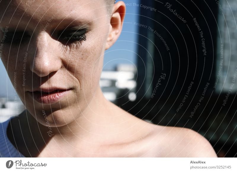 Very close portrait of a young woman Style pretty Well-being Young woman Youth (Young adults) Face Freckles 18 - 30 years Adults High-rise Bald or shaved head