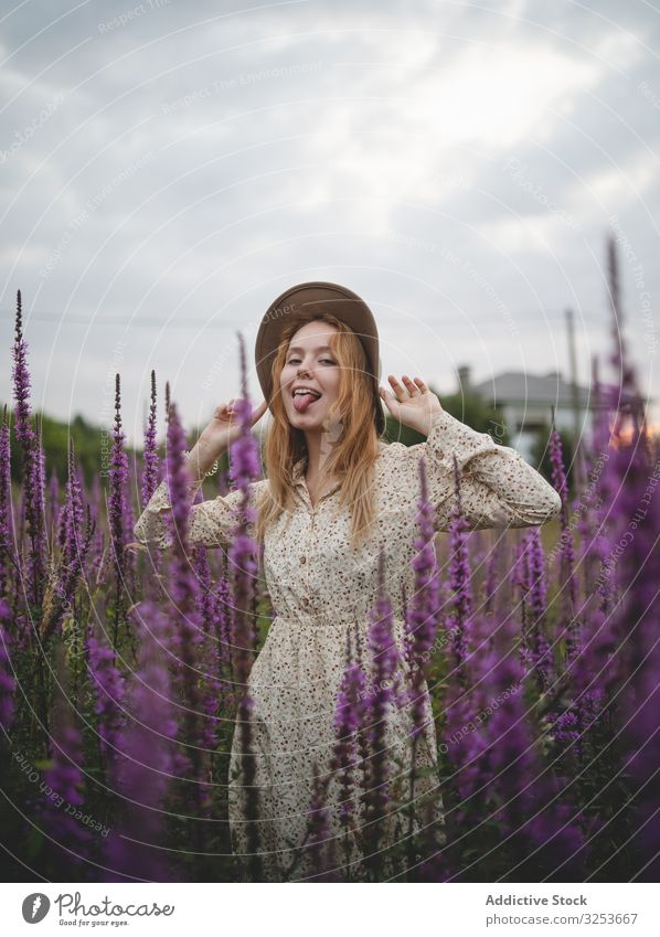 Romantic women in salvia field woman meadow enjoy sage flower blossom sensual romantic charming peaceful tender happy graceful harmony carefree rural village