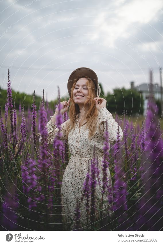 Romantic women in salvia field woman meadow enjoy sage flower blossom sensual romantic charming peaceful tender happy graceful harmony carefree rural village