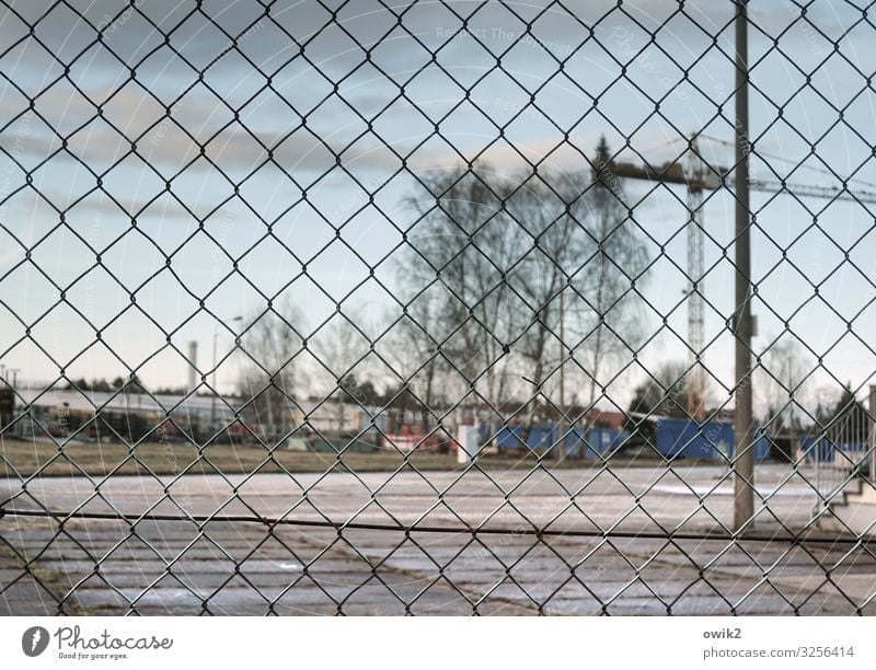 claustrophobia Sky Clouds Tree Outskirts Deserted Building Wire netting Wire netting fence Boundary Real estate Boundary line Protective Grating Barrier