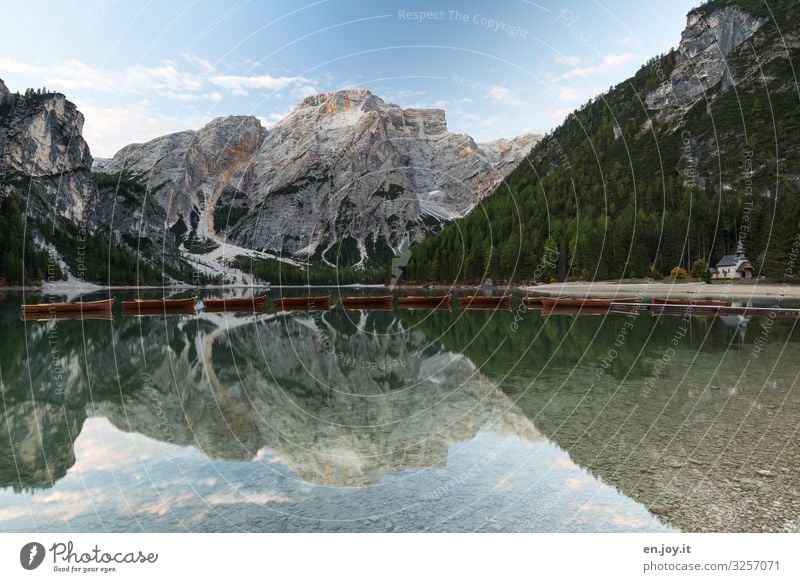 Long leash Vacation & Travel Trip Mountain Nature Landscape Sky Alps Peak Lakeside Pragser Wildsee Lake Church Chapel Rowboat Idyll Tourism Dolomites