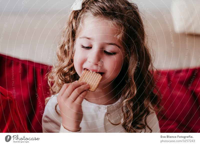 beautiful brother and sister at home having a delicious snack. Christmas concept Snack Cookie Candy Brother Sister siblings Christmas & Advent Home Blonde