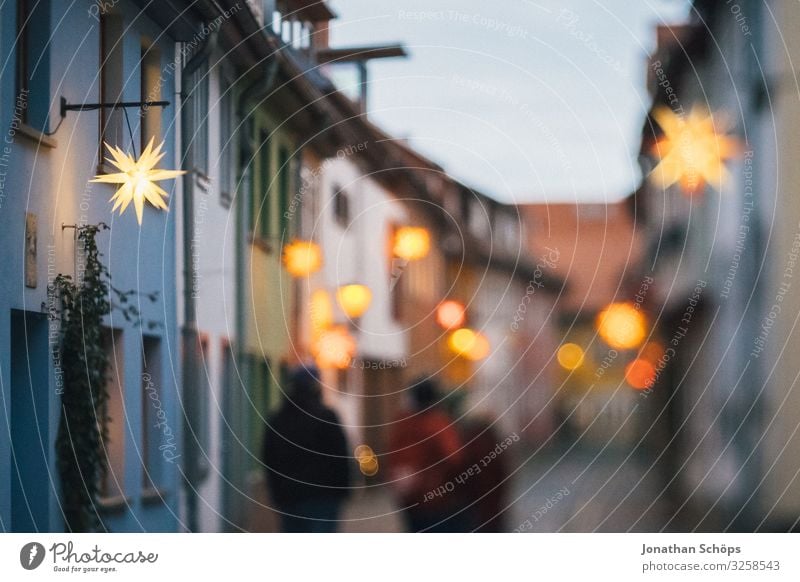 Alley with poinsettias in Erfurt Tourism House (Residential Structure) Lamp Feasts & Celebrations Christmas & Advent Human being Sky Walking Illuminate