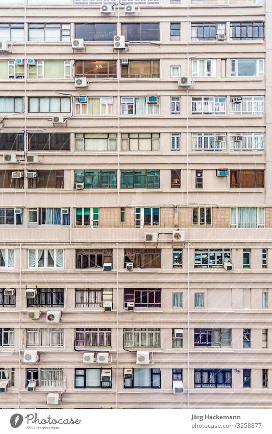 facade of an apartment house downtown Kowloon with small rooms Flat (apartment) Hongkong Asia High-rise Architecture Facade Old China Air conditioning living