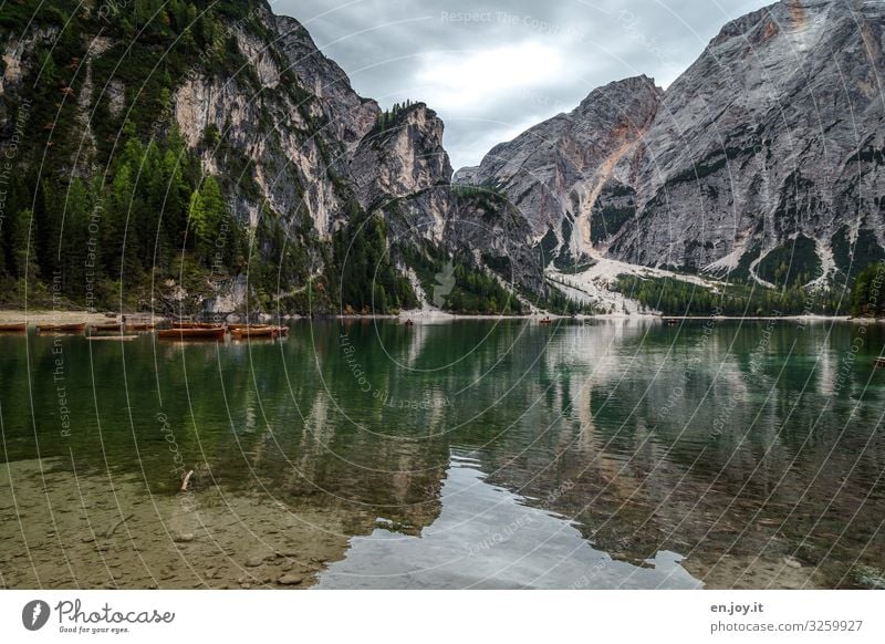 Boating Leisure and hobbies Vacation & Travel Tourism Trip Adventure Environment Nature Landscape Clouds Rock Alps Mountain Dolomites Lake Pragser Wildsee Lake