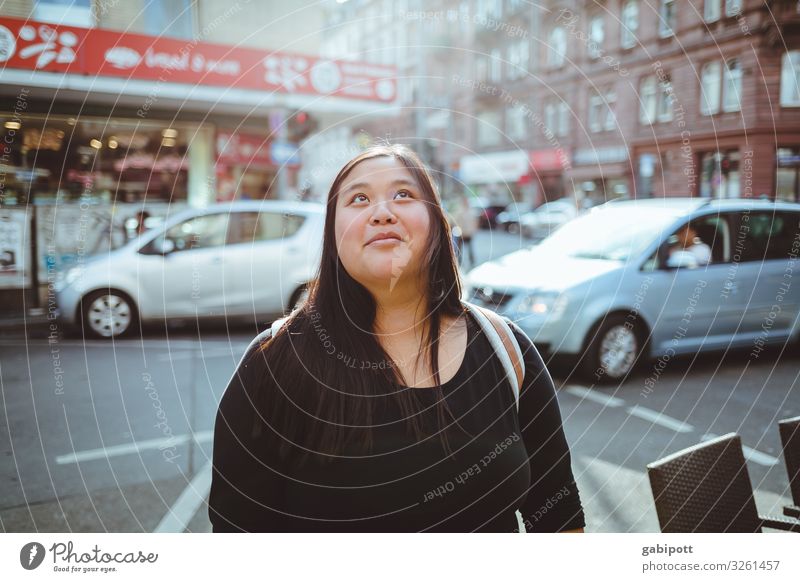 View upwards Human being Feminine Young woman Youth (Young adults) Woman Adults Life 1 18 - 30 years Town Downtown Pedestrian precinct Populated Facade Street