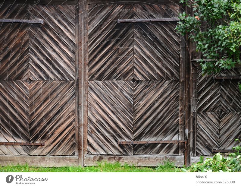 Gate III Living or residing Flat (apartment) Garden Hut Door Brown Wood Wooden door Garage Garage door Barn Barn door Metal fitting Colour photo Exterior shot