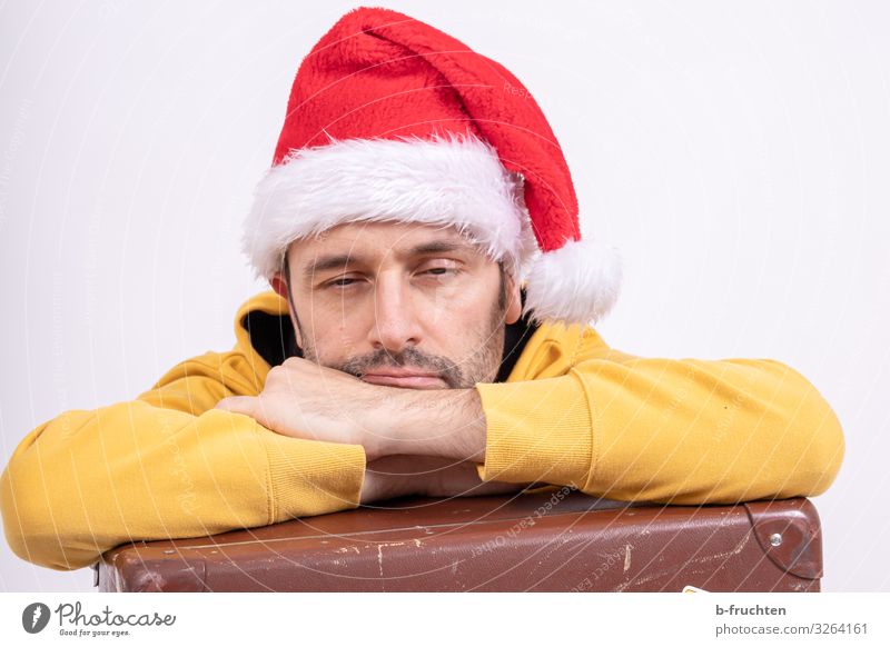 Christmas was bleak Party Event Feasts & Celebrations Christmas & Advent Man Adults Face 1 Human being 30 - 45 years Sweater Suitcase Cap Sign Touch Sleep Dark