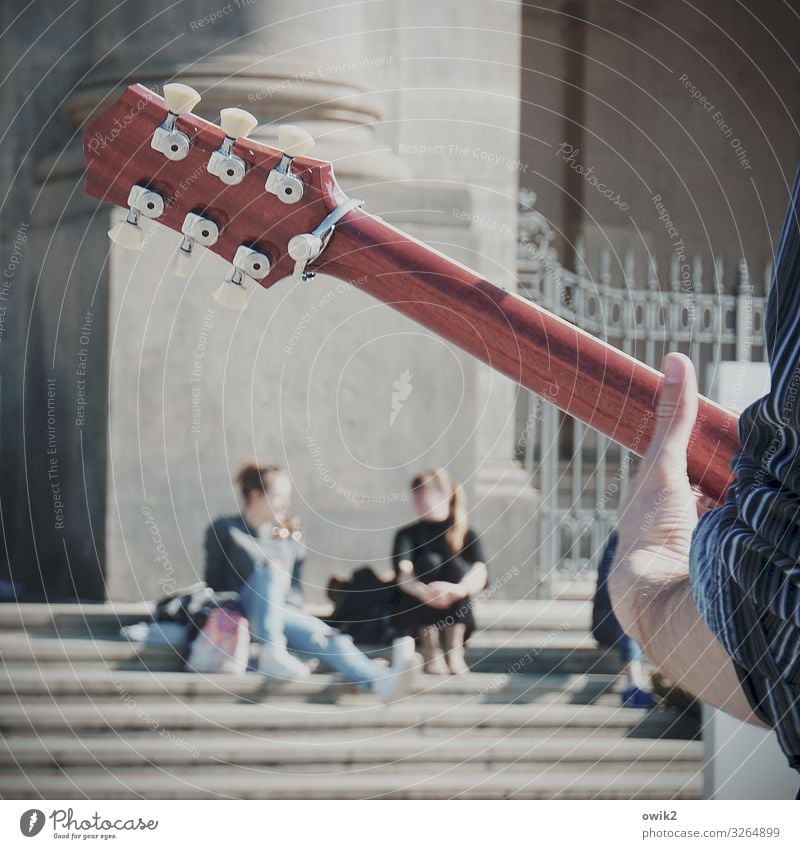 One serenade for two Young woman Youth (Young adults) Young man Hand Fingers Underarm Thumb 3 Human being Music Guitar Busker Town Downtown Populated