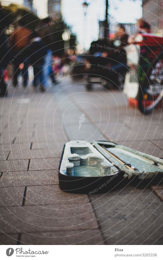 Open violin case of a street musician in the pedestrian zone Downtown Pedestrian precinct Culture Busker Musical instrument Suitcase Empty Poverty Exterior shot