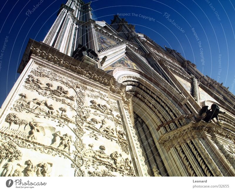 façade Facade Sculpture Mosaic Capital of a pillar Relief Religion and faith Bible Europe Italy House of worship front Cathedral Column Arch Sky