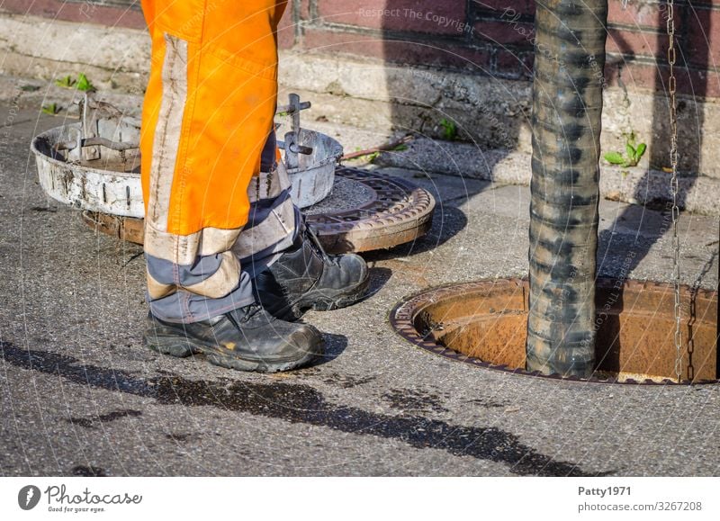 Sewer cleaning Work and employment Profession Sewage worker Industry Technology sewer cleaning Repair Cleaning Dirty Business Colour photo Exterior shot