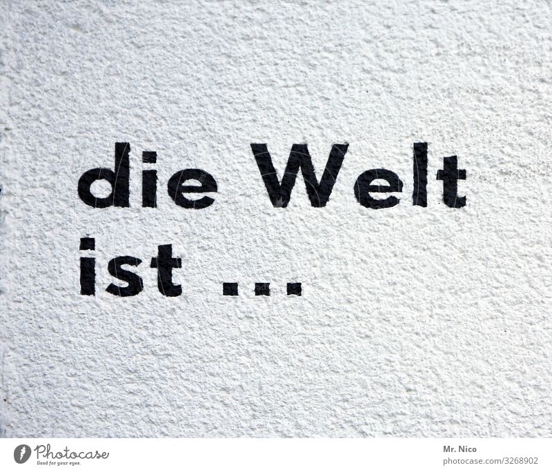 the world is... Characters Black White Proverb Text Earth Rendered facade Figure of speech Slice Round Village Letters (alphabet) Inscription Slogan Graffiti