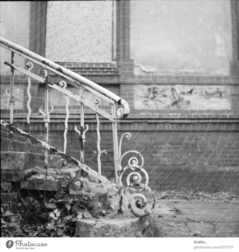 forgotten places Building Stairs Facade Metal Old Historic Broken Gray Black White Loneliness Nostalgia Decline Transience Black & white photo Exterior shot