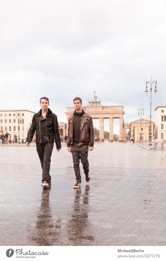 Two teenage men in front of the Brandenburg Gate in Berlin Human being Masculine Young man Youth (Young adults) 2 Tourist Attraction Landmark Walking Germany