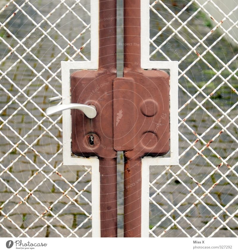 fence cross Living or residing Door Old Fence Door lock Lock Door handle Gate Metalware Rust Colour photo Exterior shot Pattern Deserted Copy Space left