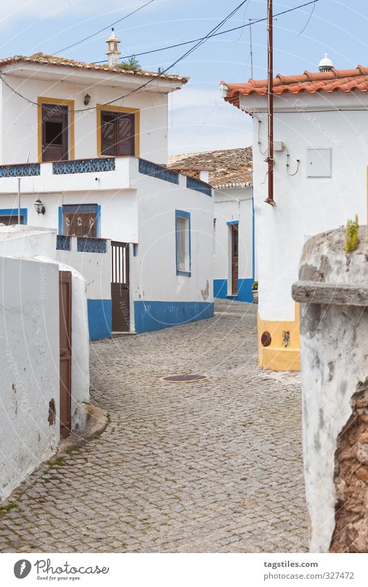 RIGHT - LEFT - RIGHT - LEFT - RIGHT ... Portugal Algarve rapeseed Right Left Change in direction Town Small Town House (Residential Structure) Street