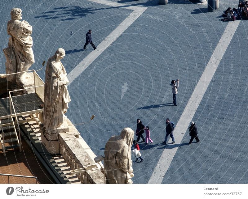 Saints and tourists Sculpture Statue Places Man Tourist Terrace Roof Lamp Religion and faith Human being Italy Rome Group Holy marketplace Cobblestones Ladder