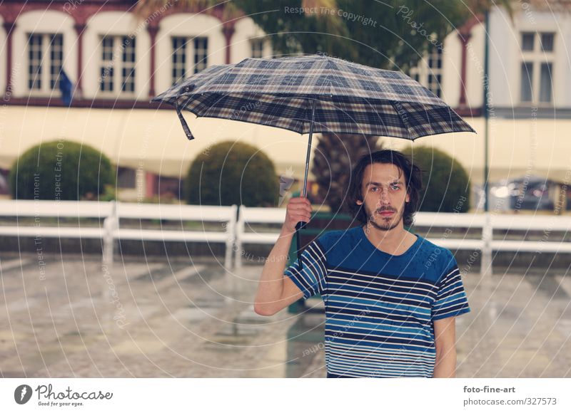 Man with the umbrella Human being Masculine Young man Youth (Young adults) 1 18 - 30 years Adults Bad weather Storm Rain Karlovy Vary Czech Republic Europe Town