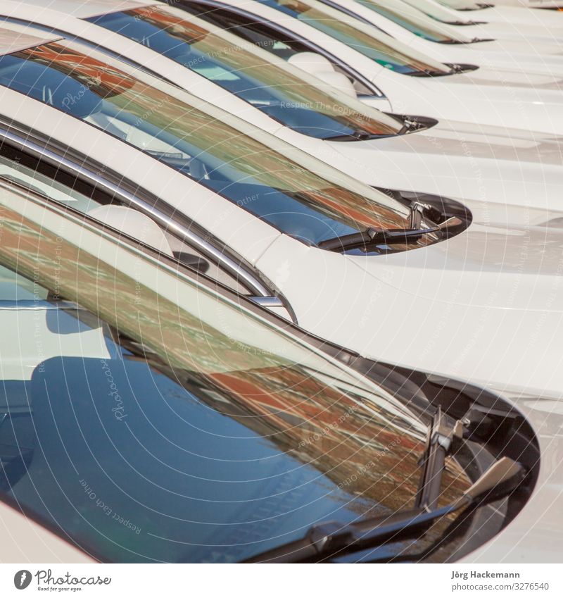 detail of white cars parking Transport Shield White background Motor vehicle many Parking row Symbols and metaphors Detail