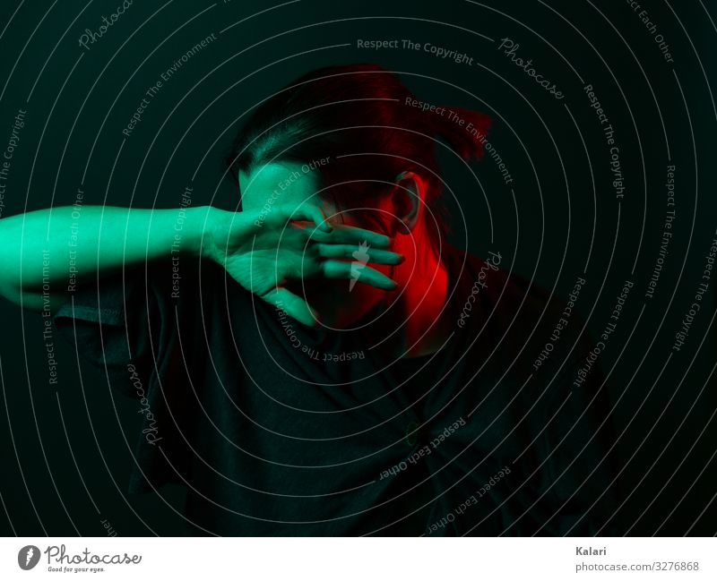 Isolated woman hides her face behind her hand Woman Loneliness depressive on one's own by hand hide sb./sth. insulation emotion Black suffer experimental