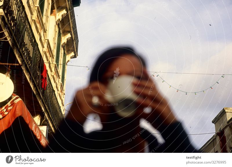 have coffee Drinking Coffee Feminine Woman Adults Face 1 Human being Town Old town House (Residential Structure) Facade Sit To enjoy Colour photo Exterior shot