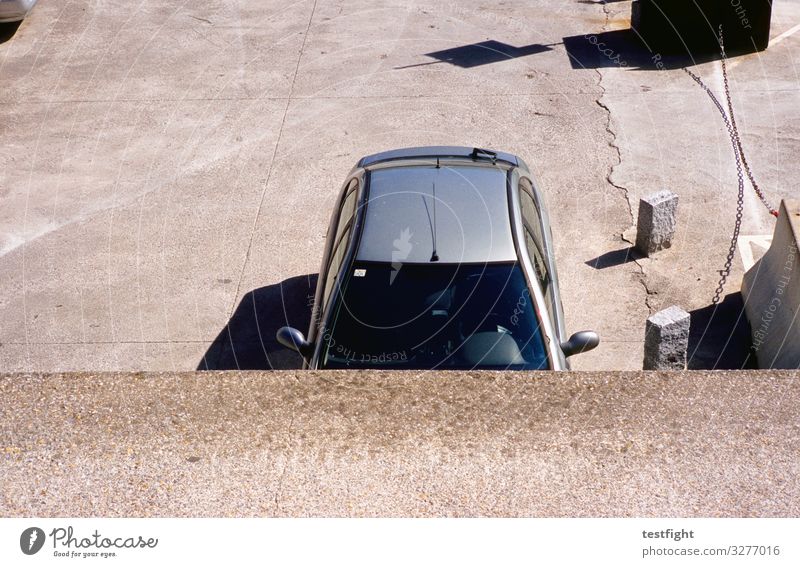 parking car Outskirts Transport Street Vehicle Car Observe Concrete Metal Roof Shadow Colour photo Exterior shot Copy Space bottom Light Contrast