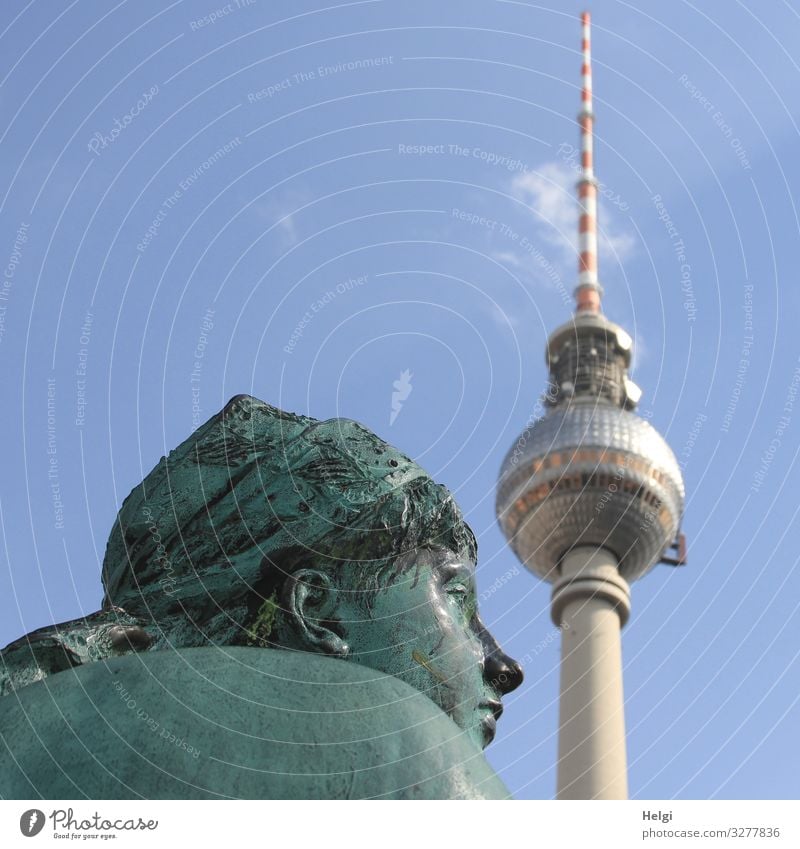 Bronze figure of the Neptune Fountain next to the Berlin TV Tower Tourism Art Work of art Sculpture Architecture Sky Clouds Neptune Well Tourist Attraction