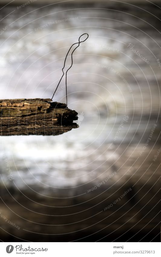 Male, suicidal person stands at the precipice and looks down | wire figures Man abyss suicide look down wood Wire stylized desperate sad Perturbed hopelessness