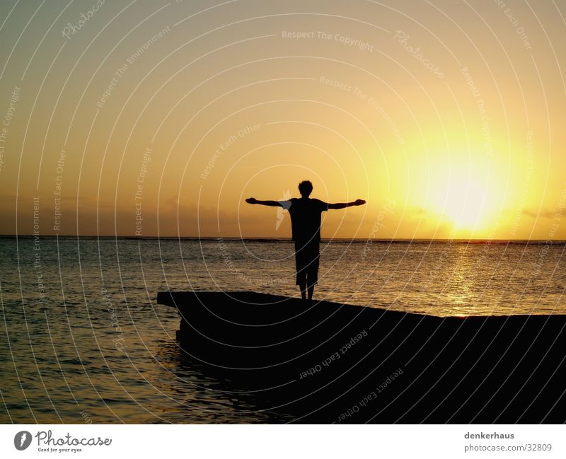 The cross Sunset Yellow Silhouette Black Footbridge Orange Human being Shadow Water Island