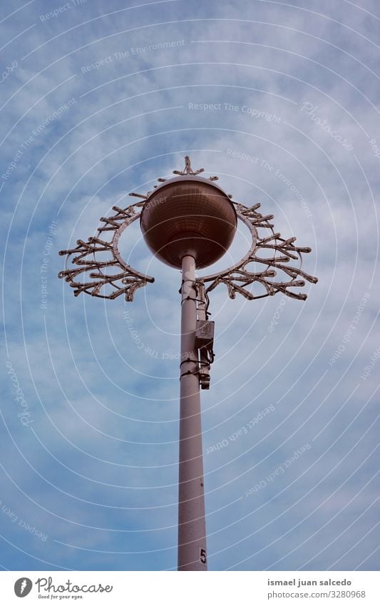 street lamp and blue sky on the street Street lamp Street lighting Lamp post Lighting Illumination lighting equipment City Metal Object photography