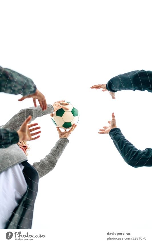 Three generations playing with soccer ball Lifestyle Joy Happy Playing Beach Child Human being Woman Adults Mother Grandmother Family & Relations Hand Sky