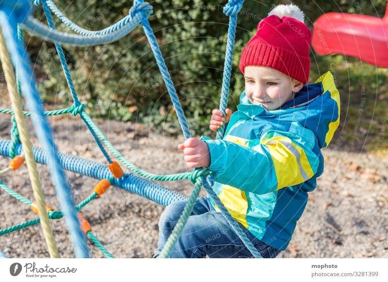 Boy on a climbing frame Toddler out three years experience Joy Scaffolding Jacket Boy (child) Child Infancy climbing scaffold Climbing Laughter smile Manly cap