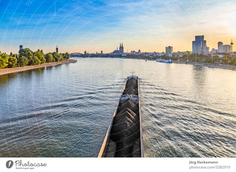 skyline of Cologne with river Rhine Tourism River Town Skyline Church Harbour Bridge Building Transport Watercraft Blue Energy Cathedral attraction center City