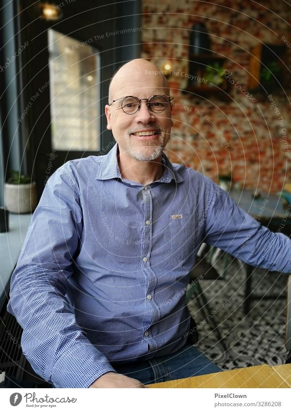 An old man at peace with himself Man Only one man 1 Person Adults portrait Eyeglasses Bald or shaved head Flat (apartment) Shirt Laughter luck