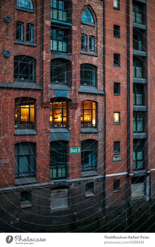 warehouse district Town Orange Red Old warehouse district Window Light Hamburg Germany Tourism Colour photo Exterior shot Deserted