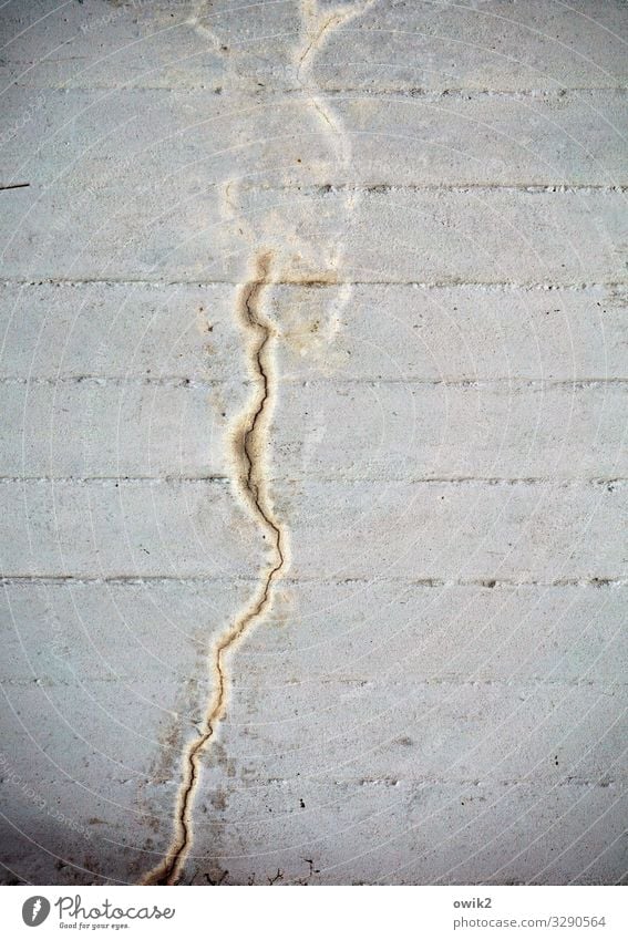 Concrete crack Wall (barrier) Wall (building) Simple Firm Gray Smear Tracks Drainage Rough Hard Unclear Colour photo Subdued colour Exterior shot