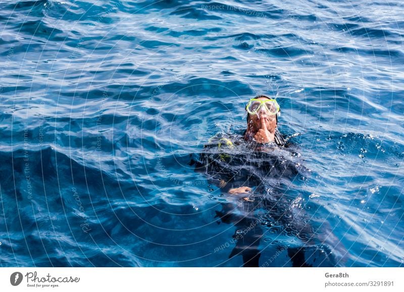 diving instructor entertains tourists in Red Sea Egypt Sharm El Sheikh South Sinai Blue depict Diver Excursion Fountain Joy School Joke Mask Mouth Ocean